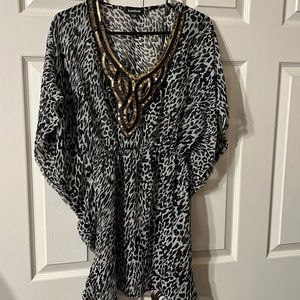 Ladies size Small Bebe top.